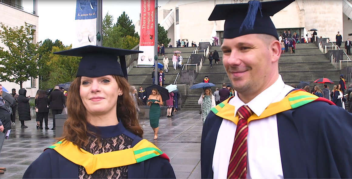 Married couple at graduation